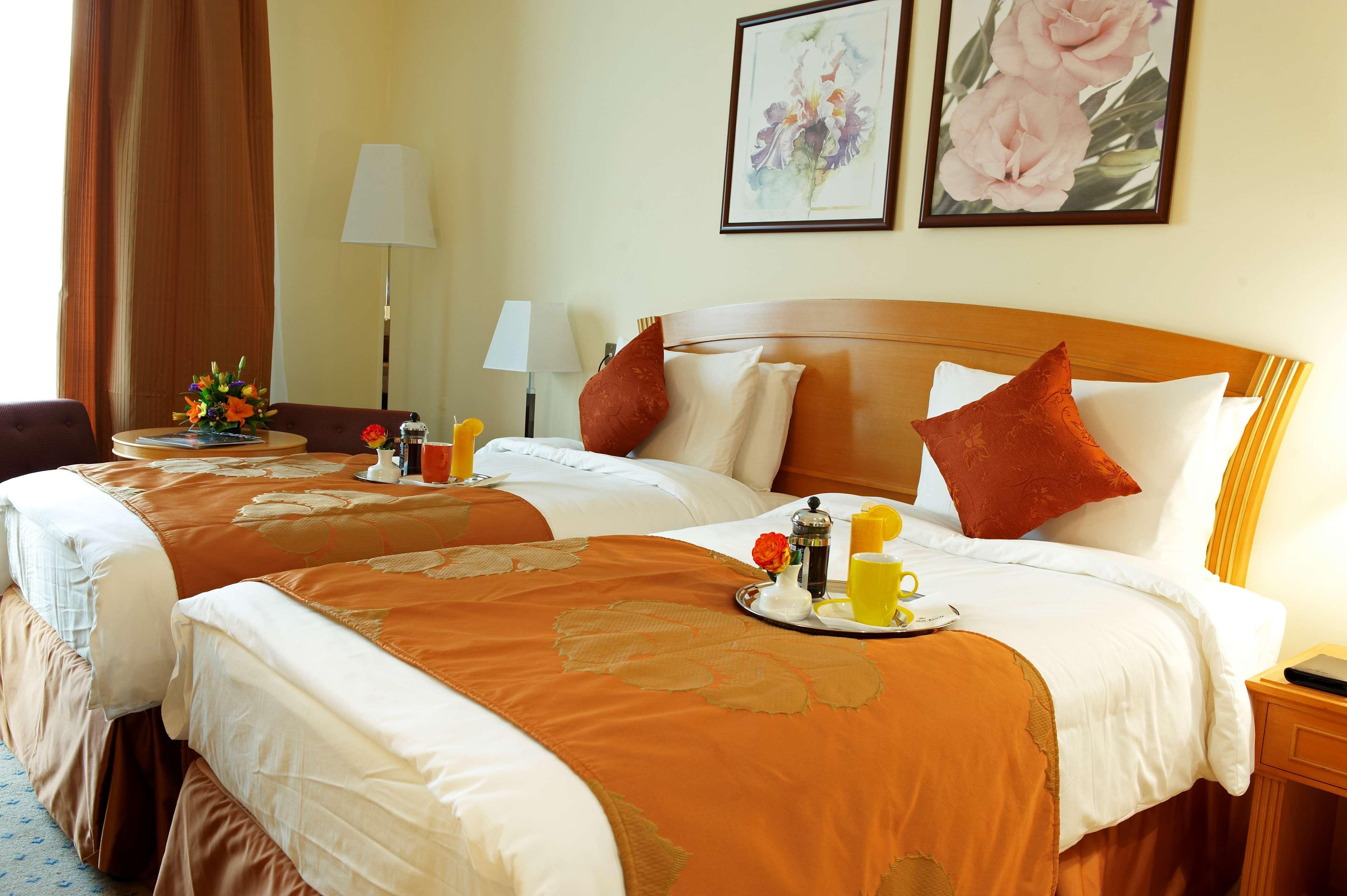 Golden Tulip Sharjah Aparthotel Exterior foto